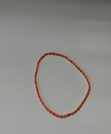 Curlt life reddish orange oval-shaped coral bead necklace